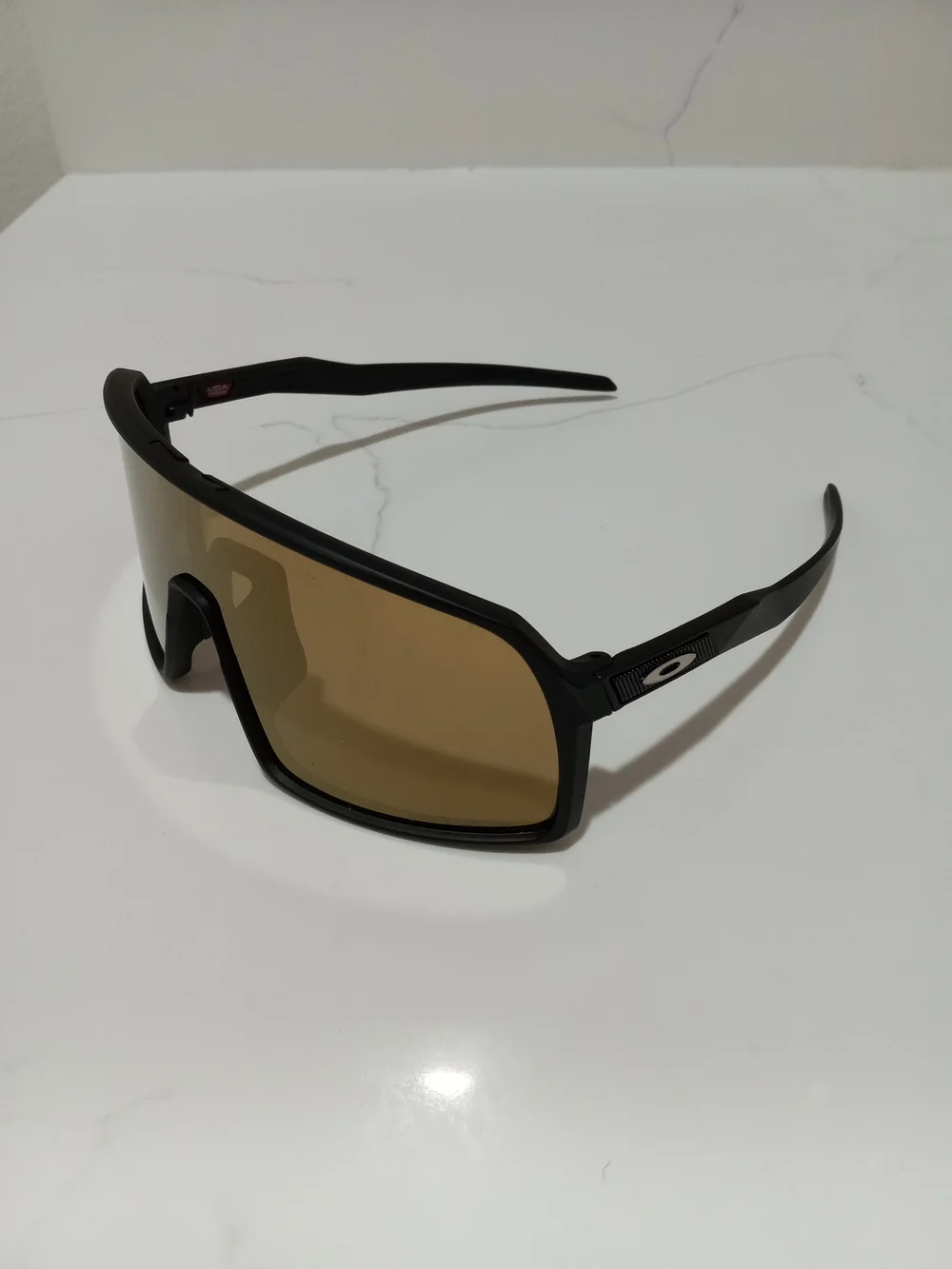 Oakley Black Frame Sunglasses with Brown Lenses